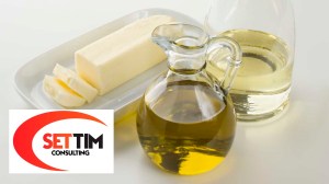 Butter, oil and water on table